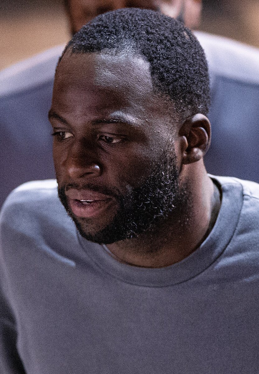 Draymond Green playing basketball for the Golden State Warriors
