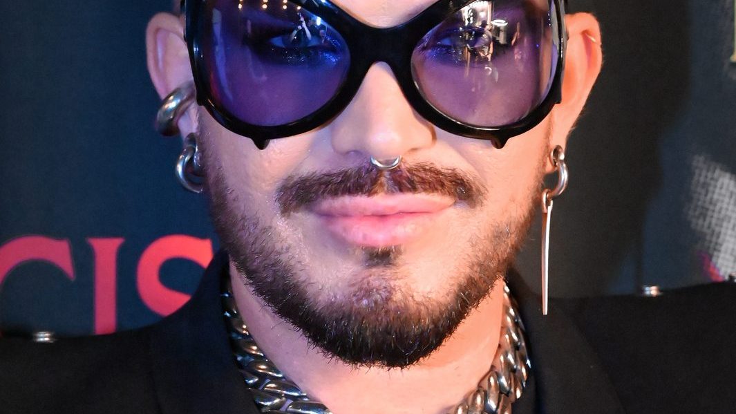 Adam Lambert performing on stage