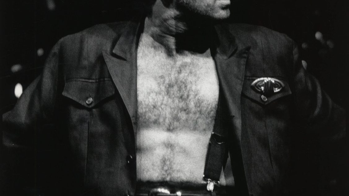 George Michael performing on stage in the 1980s