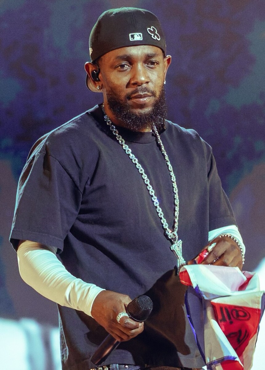 Kendrick Lamar performing on stage
