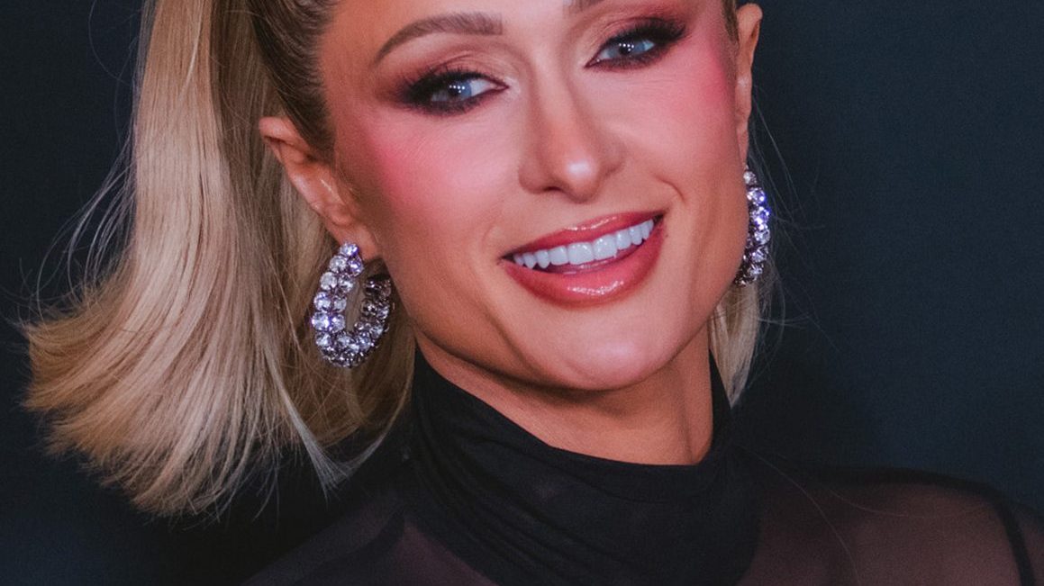 Paris Hilton smiling at an event
