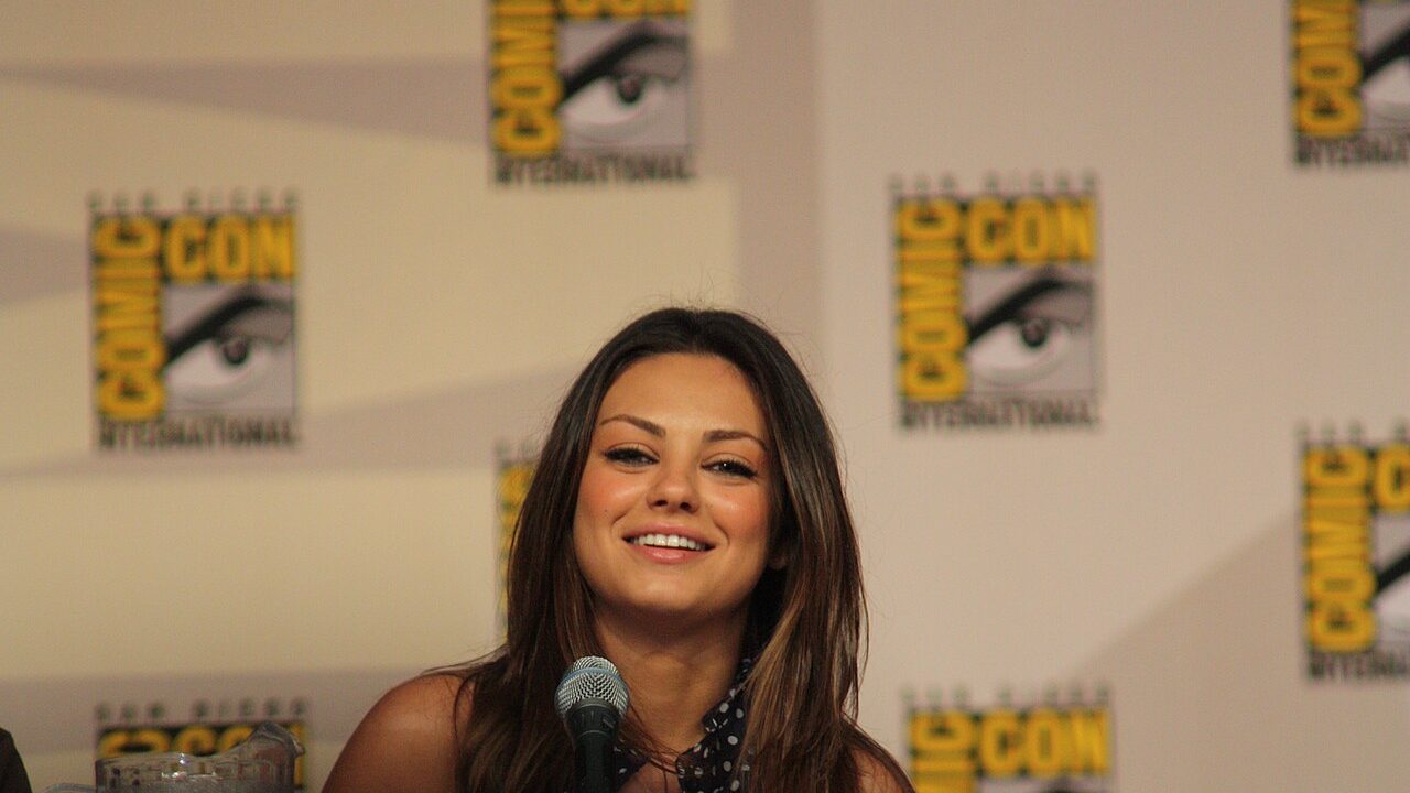 Mila Kunis biography profile photo