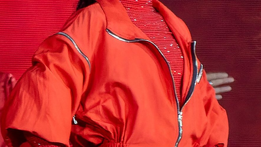 Blue Ivy Carter posing on the red carpet in a stylish outfit