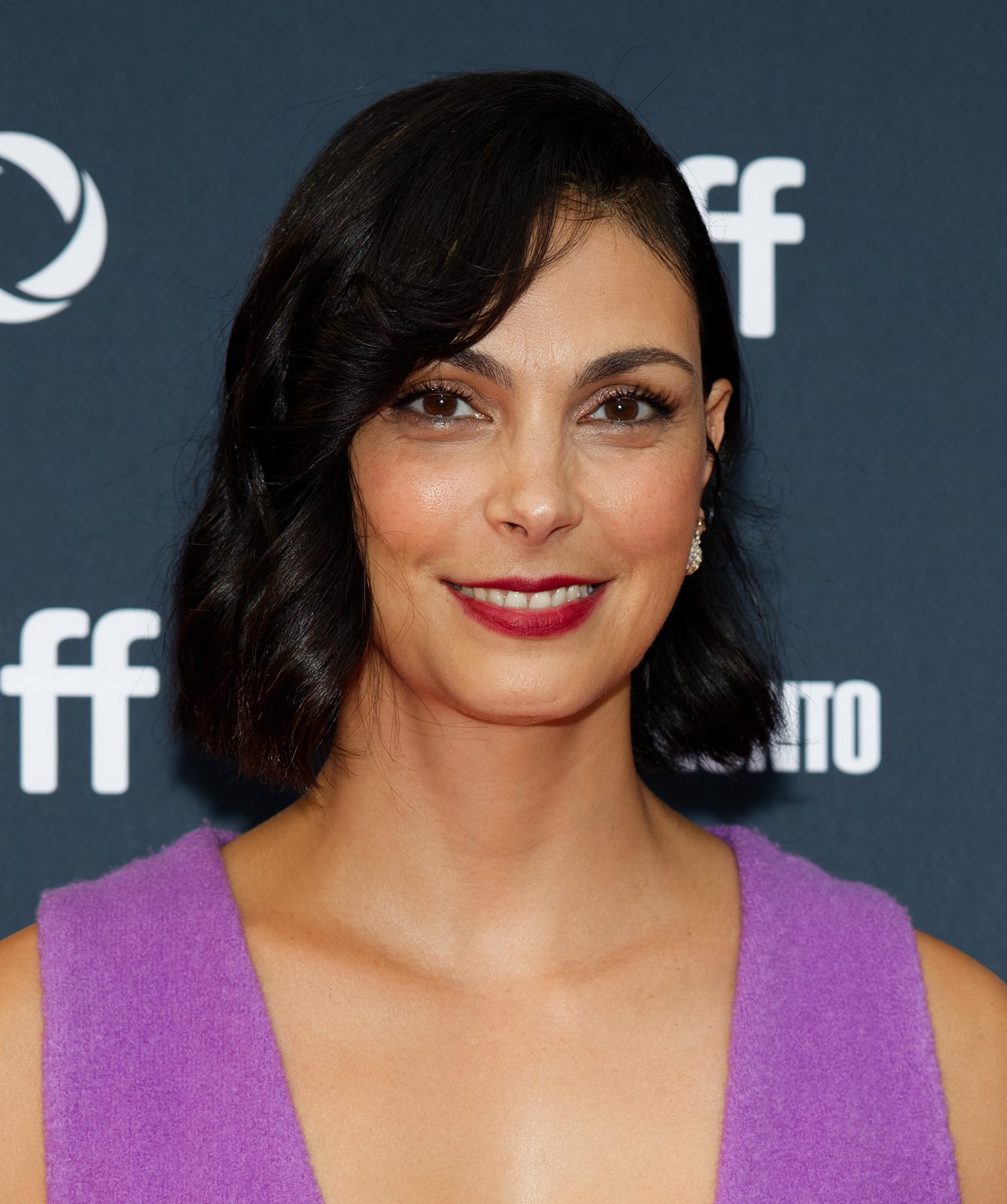 Morena Baccarin smiling at a television premiere event