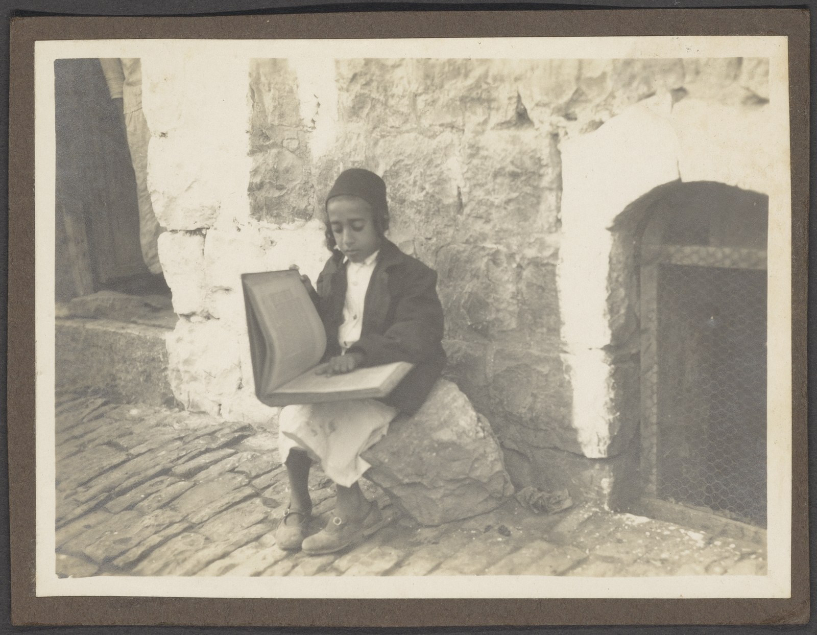 Thematic illustration: a child reading a book
