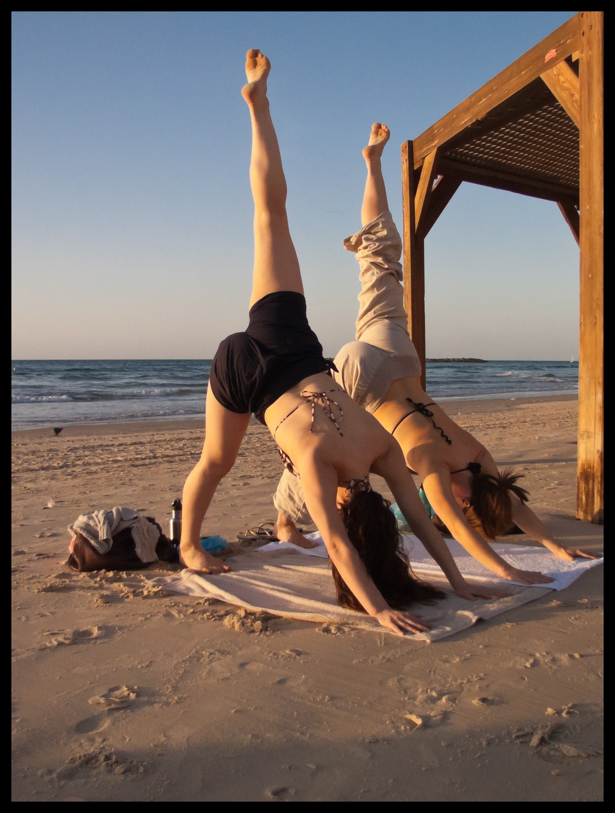 Thematic illustration: beach yoga at sunset