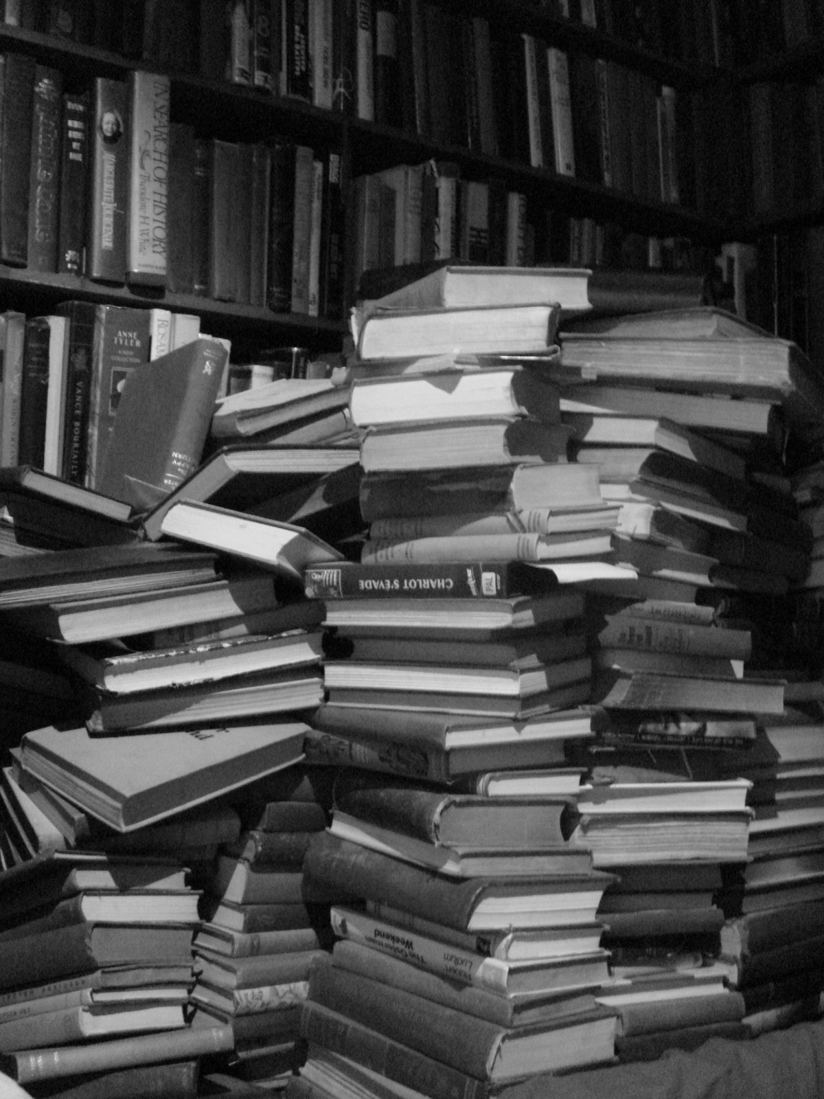 Thematic illustration: a stack of books with a small chair
