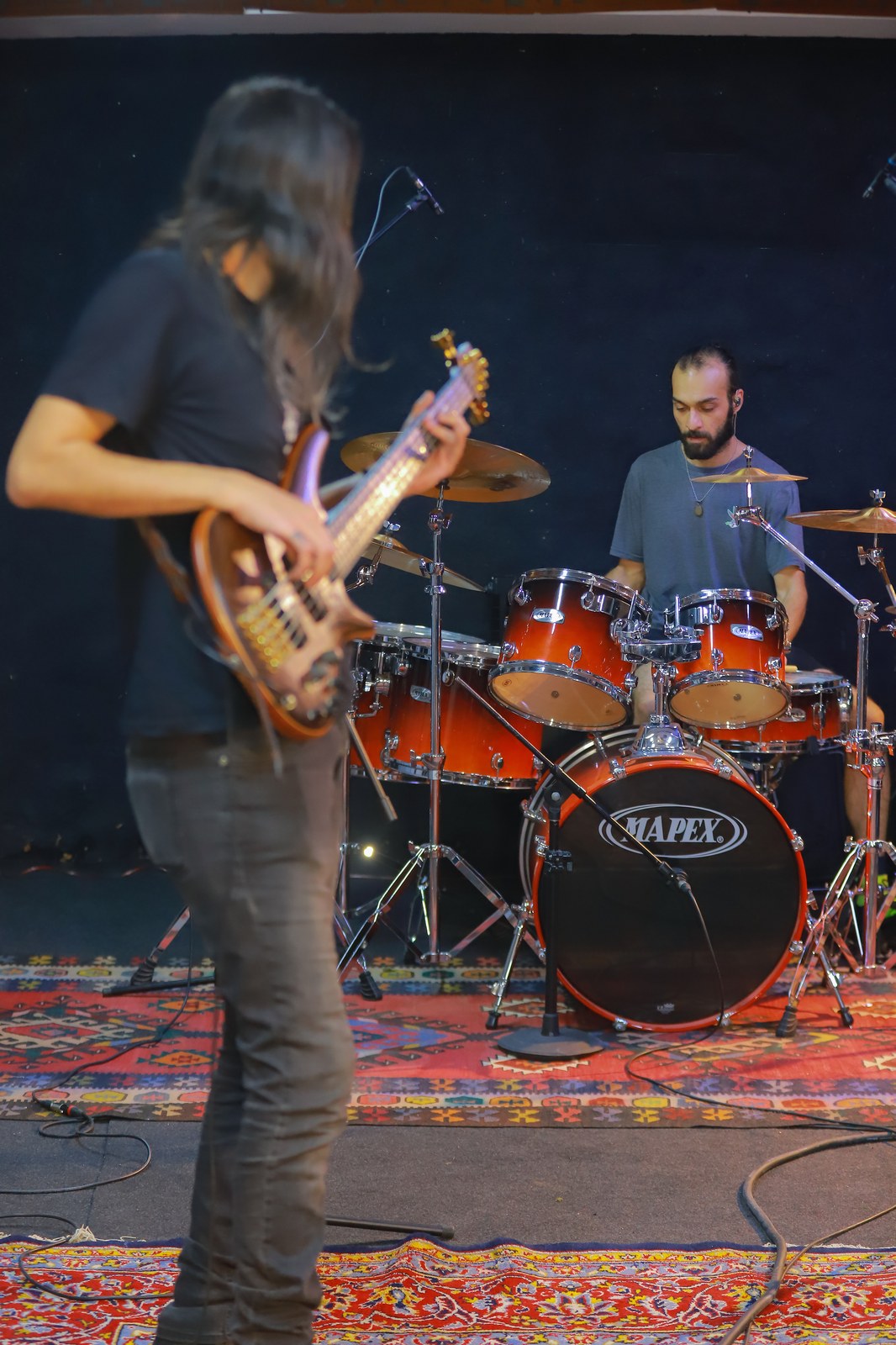 Thematic illustration: a drum kit on a stage