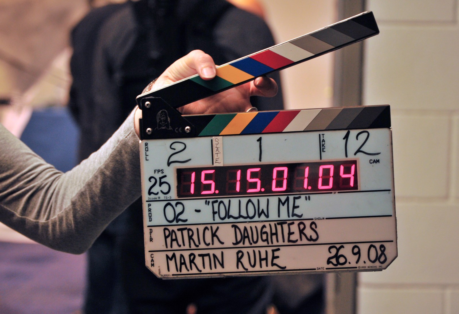 Thematic illustration: a film clapperboard on a set