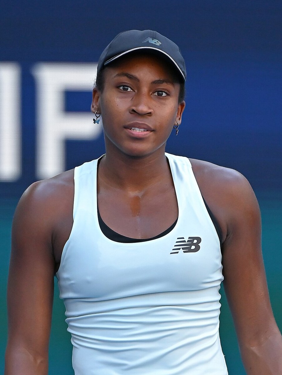 Coco Gauff playing tennis at a Grand Slam