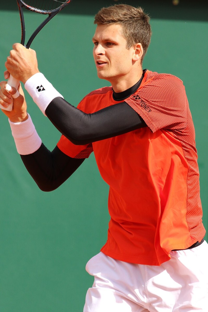 Hubert Hurkacz playing tennis at Wimbledon