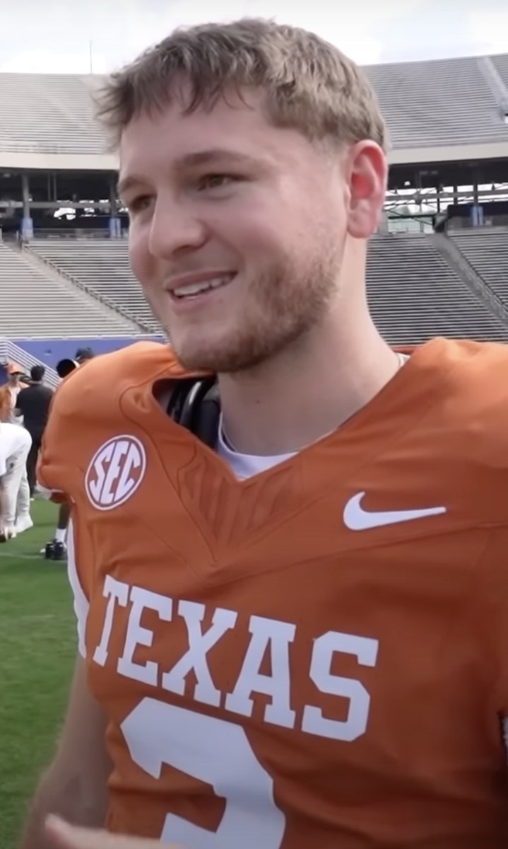 Quinn Ewers playing quarterback in football
