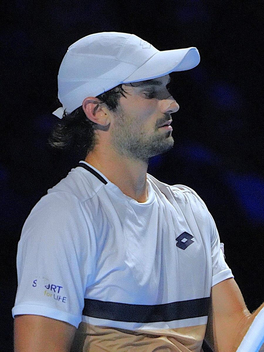 Valentin Vacherot playing tennis at a tournament